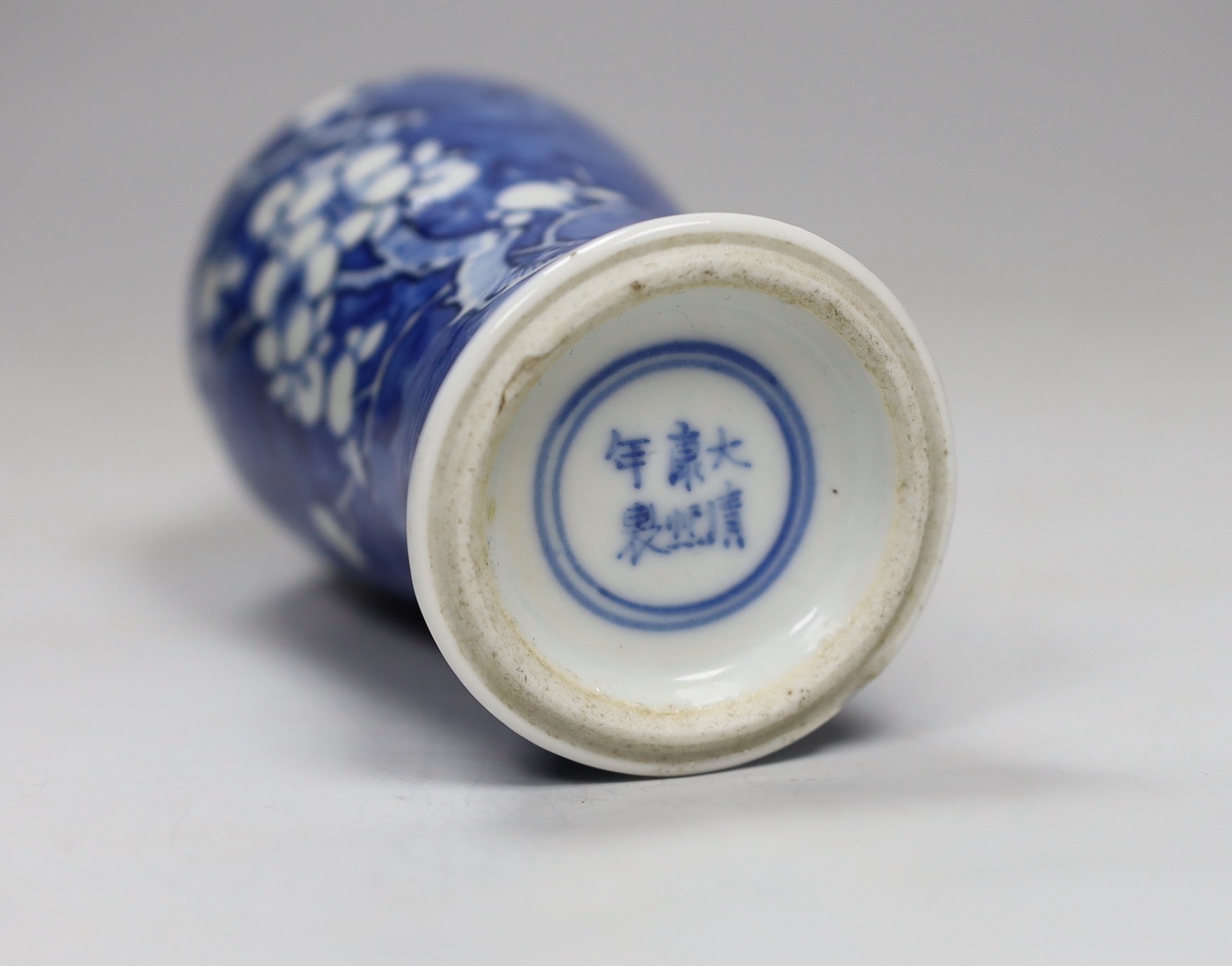 A 19th century Chinese blue and white prunus vase, 13.5cm tall